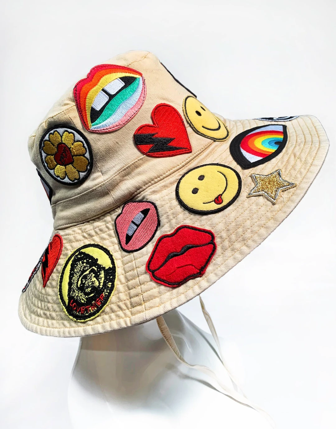 Lauren Moshi Adina- Bucket Hat W/ Allover Hippie Patches 1 Lauren Moshi Adina- Bucket Hat W/ Allover Hippie Patches